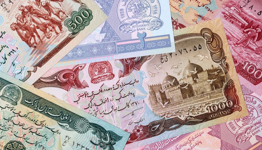 Afghani banknotes representing local currency and business setup in Afghanistan